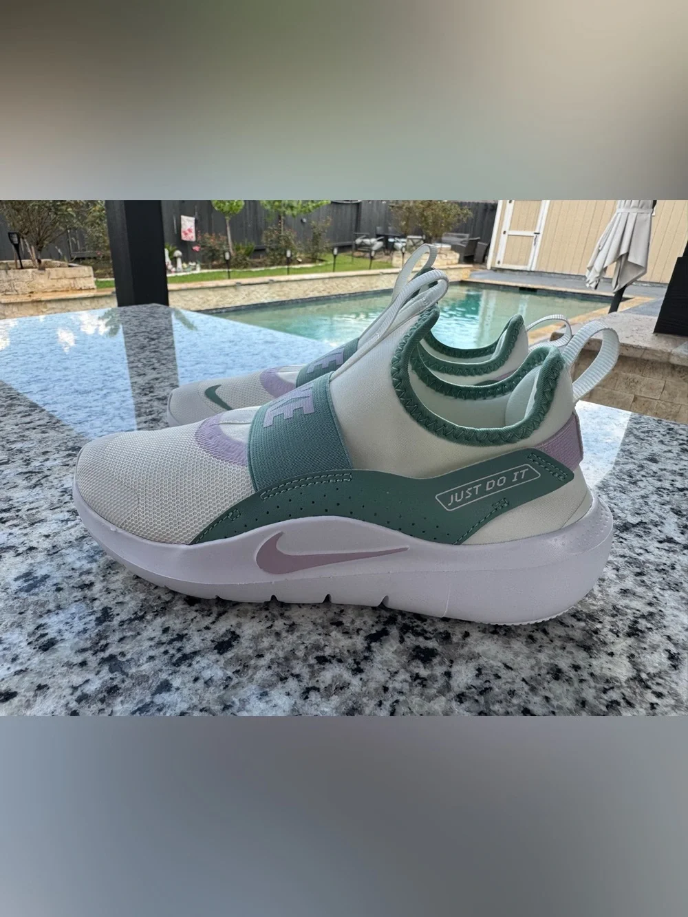 Nike Slip-On Sneakers in White with Mint and Lavender Accents size 4.5 Y